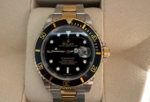 Rolex submariner date gold steal with black dial