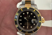 Rolex submariner date gold steal with black dial