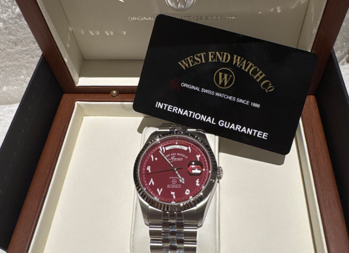 West end maroon dial watch