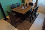 Dining table with 6 chairs in good condition from Danube Home (negotiable).