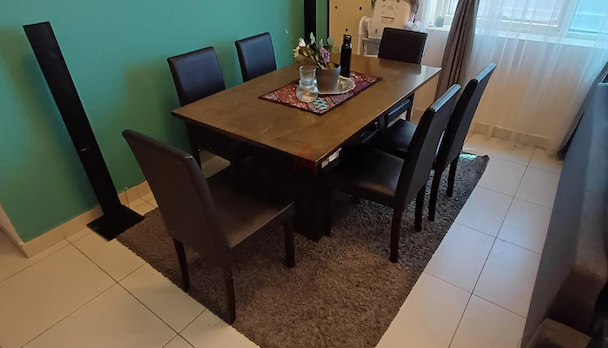 Dining table with 6 chairs in good condition from Danube Home (negotiable).