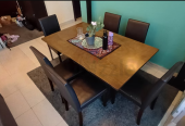 Dining table with 6 chairs in good condition from Danube Home (negotiable).