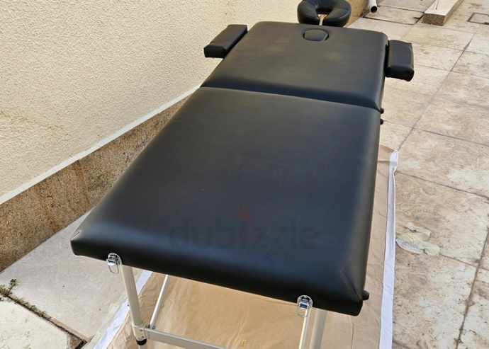 Massage table