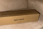 Dyson Airstrait with carrying case.Never used.