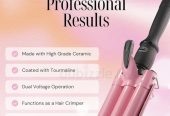 HAIR CURLER WITH THREE BARRELS