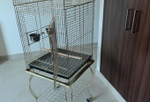 SELLIG GOLDEN PARROT CAGE IN PERFECT CONDITION WITH STAINLESS STEEL CUPS