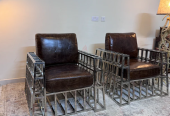 An Andrew Martin Barbarossa armchairs Early 21st century