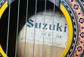 Suzuki 3/4 size classical guitar with bag