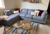 Living room – Couch cushions tables carpet