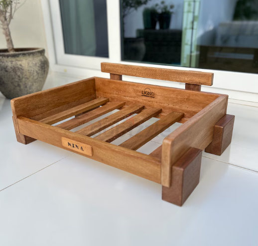 Contemporary hard wood pet bed. Brand new.