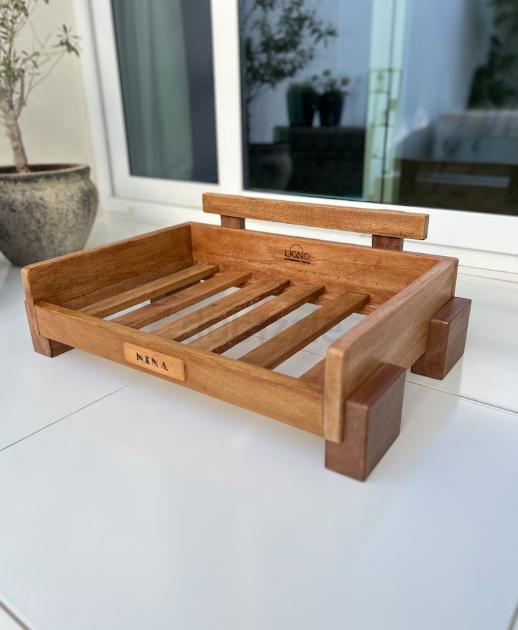 Contemporary hard wood pet bed. Brand new.