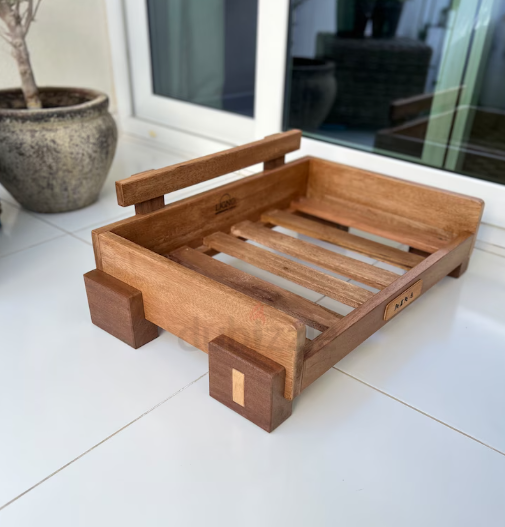 Contemporary hard wood pet bed. Brand new.