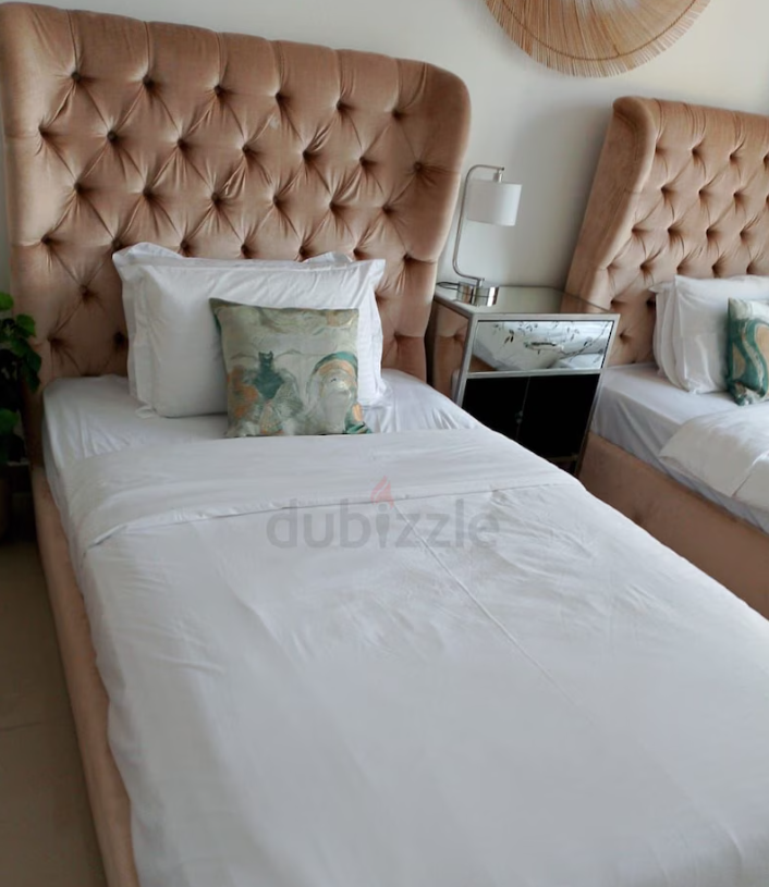 The one designer double beds with wall decor and excellent mattresses