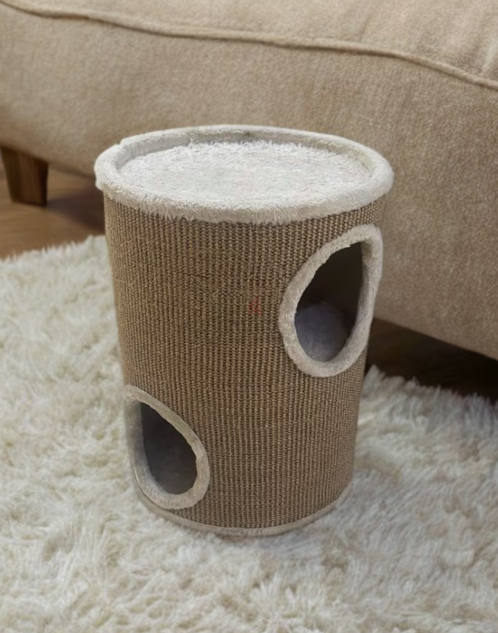 Cat scratcher with two sleeping holes