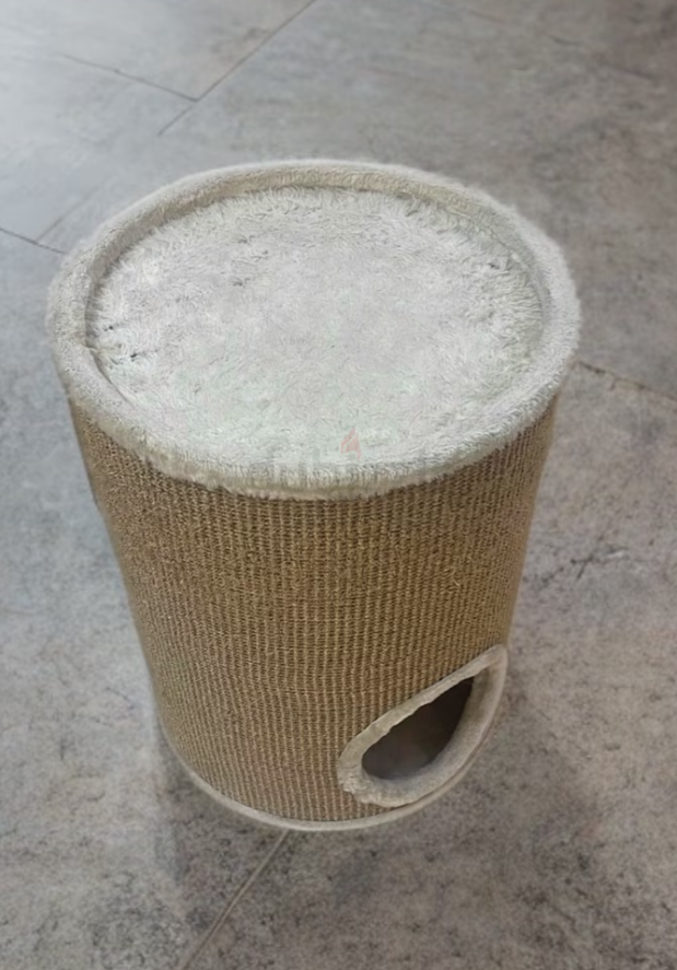 Cat scratcher with two sleeping holes