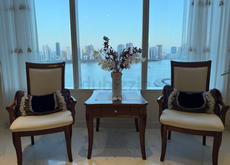 2 Arm chairs with coffee table