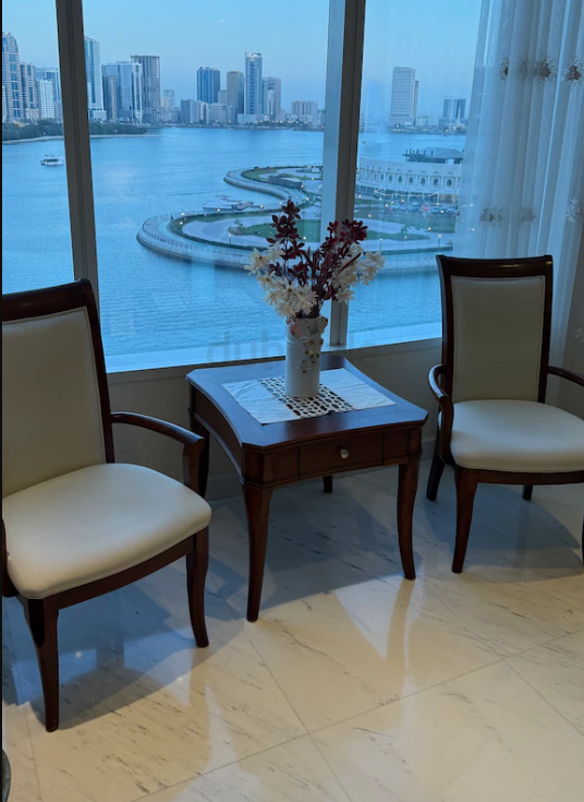 2 Arm chairs with coffee table