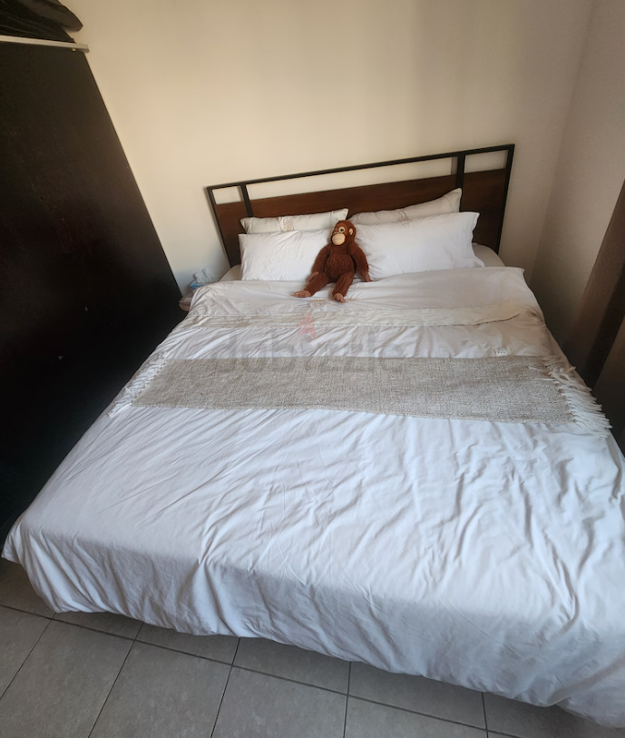 Queen Bed with attrass and night Stand… almost new