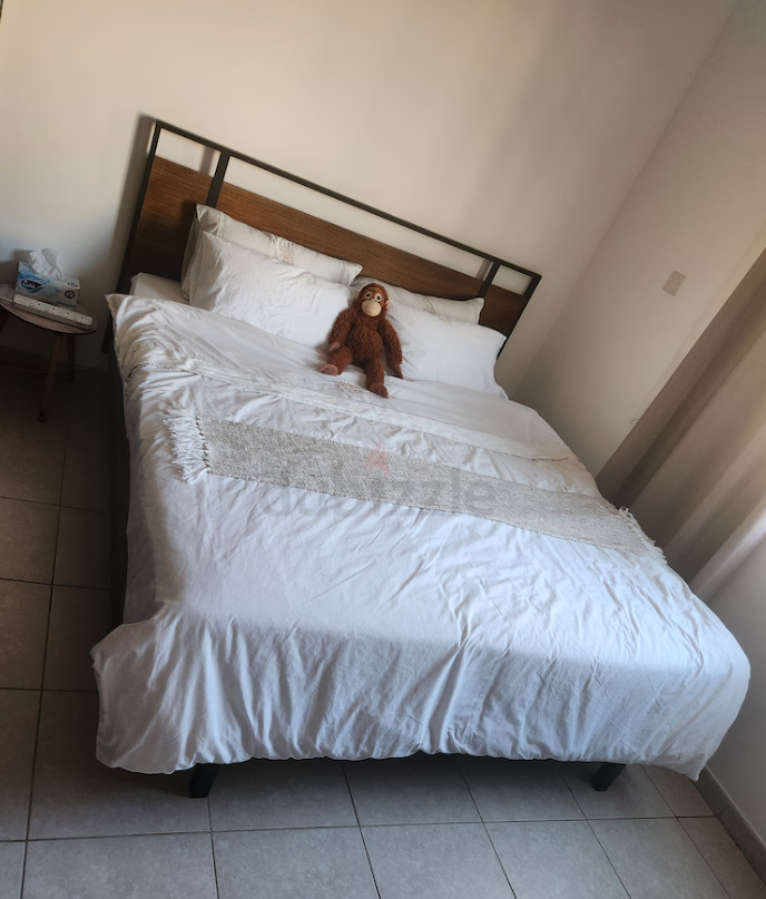 Queen Bed with attrass and night Stand… almost new