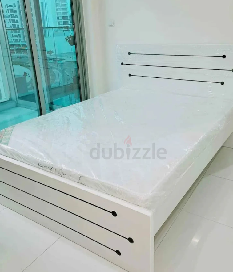 New wood twin bed with mattress sell