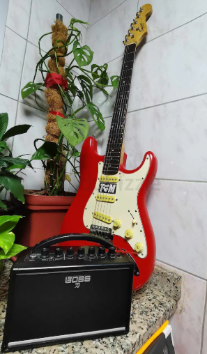 Squire Stratocaster (w/ bag accessories) + Boss Katana Mini