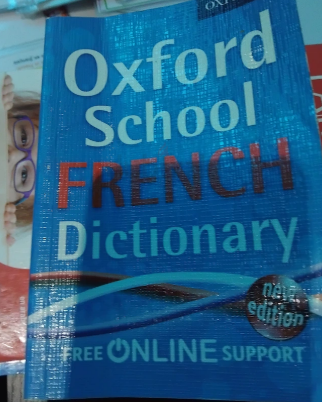 In original packaging brand new French books, dictionary with CDs