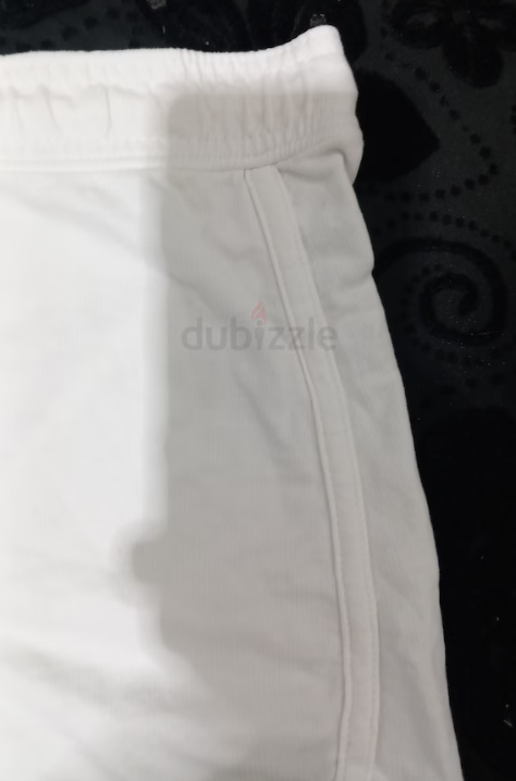 Plain white cotton shorts, size 12