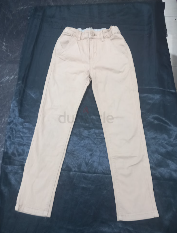 Beige cloth pants for boys, size 5 to 6 years