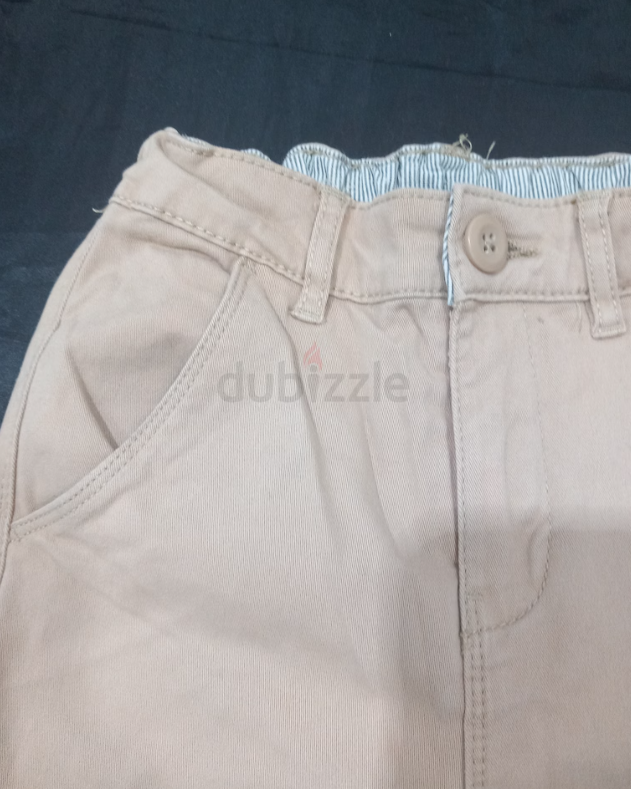 Beige cloth pants for boys, size 5 to 6 years
