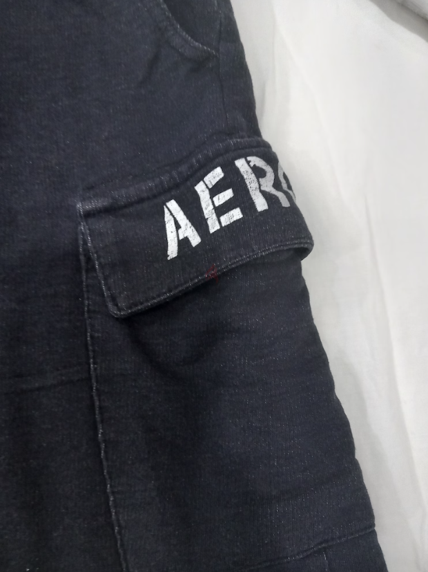 Black cotton shorts for boys, size 8 years