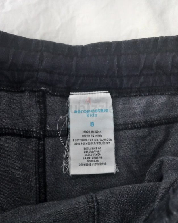 Black cotton shorts for boys, size 8 years