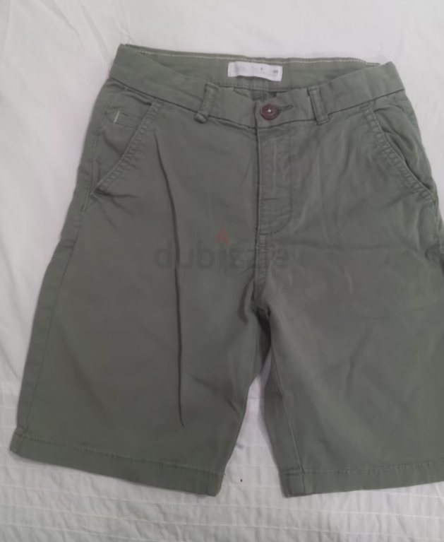 Boys olive shorts, size 8 years