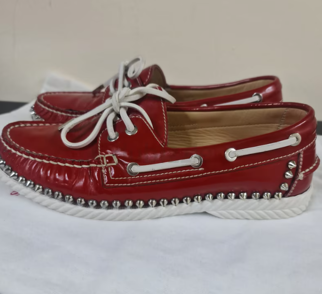 Authentic Christian Louboutin 38/5 still new.