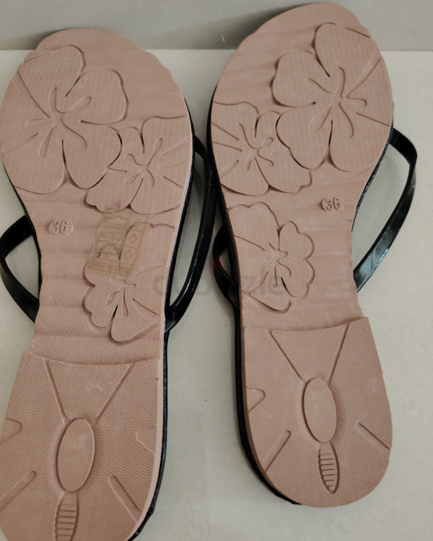 Brand New black slippers Aed 10