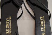 Brand New black slippers Aed 10