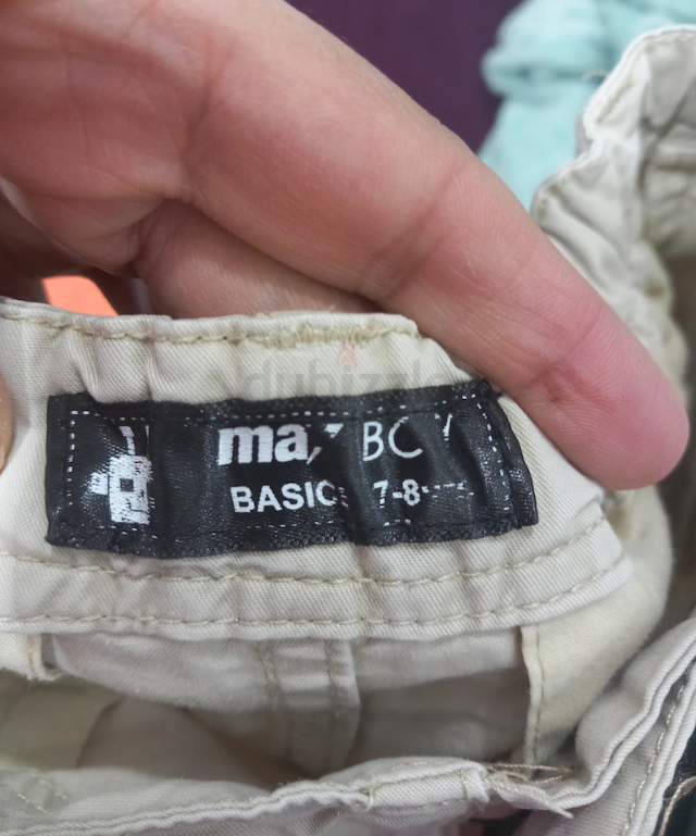 Light and dark beige shorts for boys, size 7 to 8 years