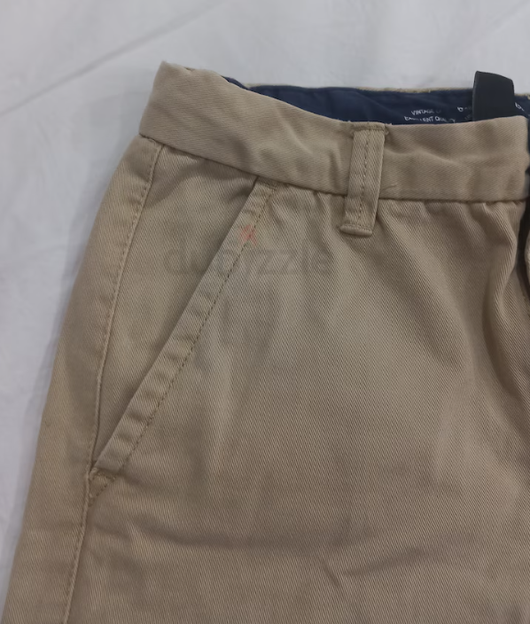 Light and dark beige shorts for boys, size 7 to 8 years