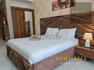 Cosy Studio and balcony Garden overlooking of Burj Khalifa